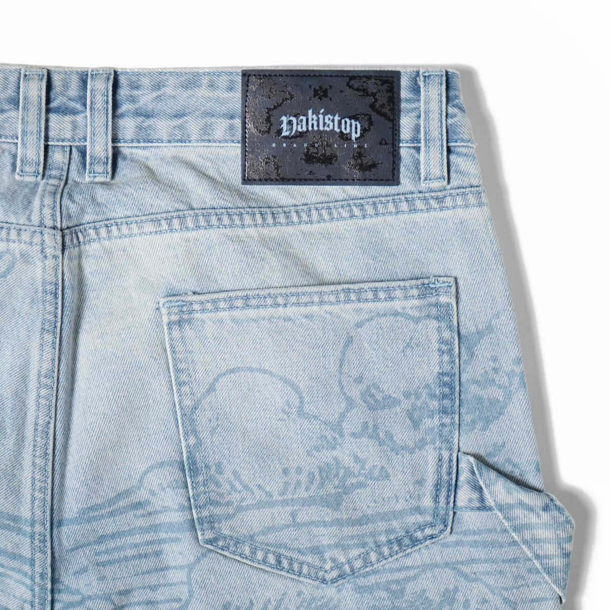 Light blue denim jeans with a brand label on a white background