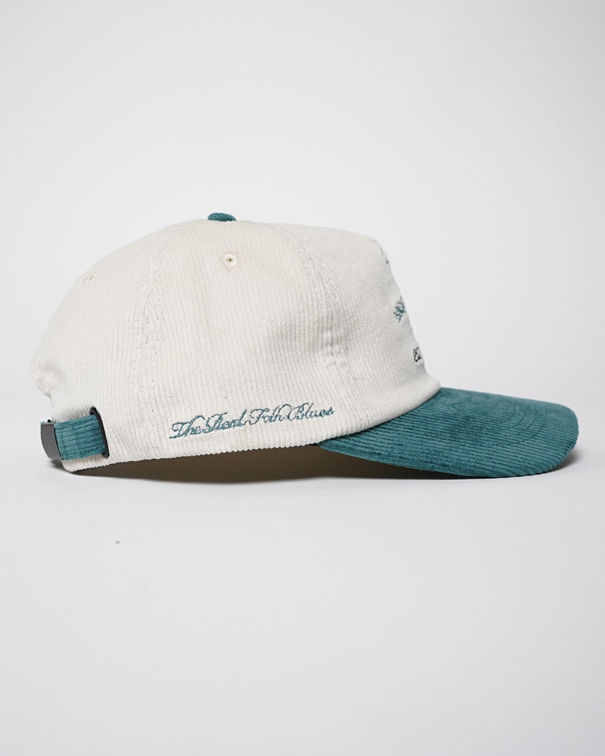 Easy Come Easy Go Hat in white and tennis green corduroy with embroidered text, side view.