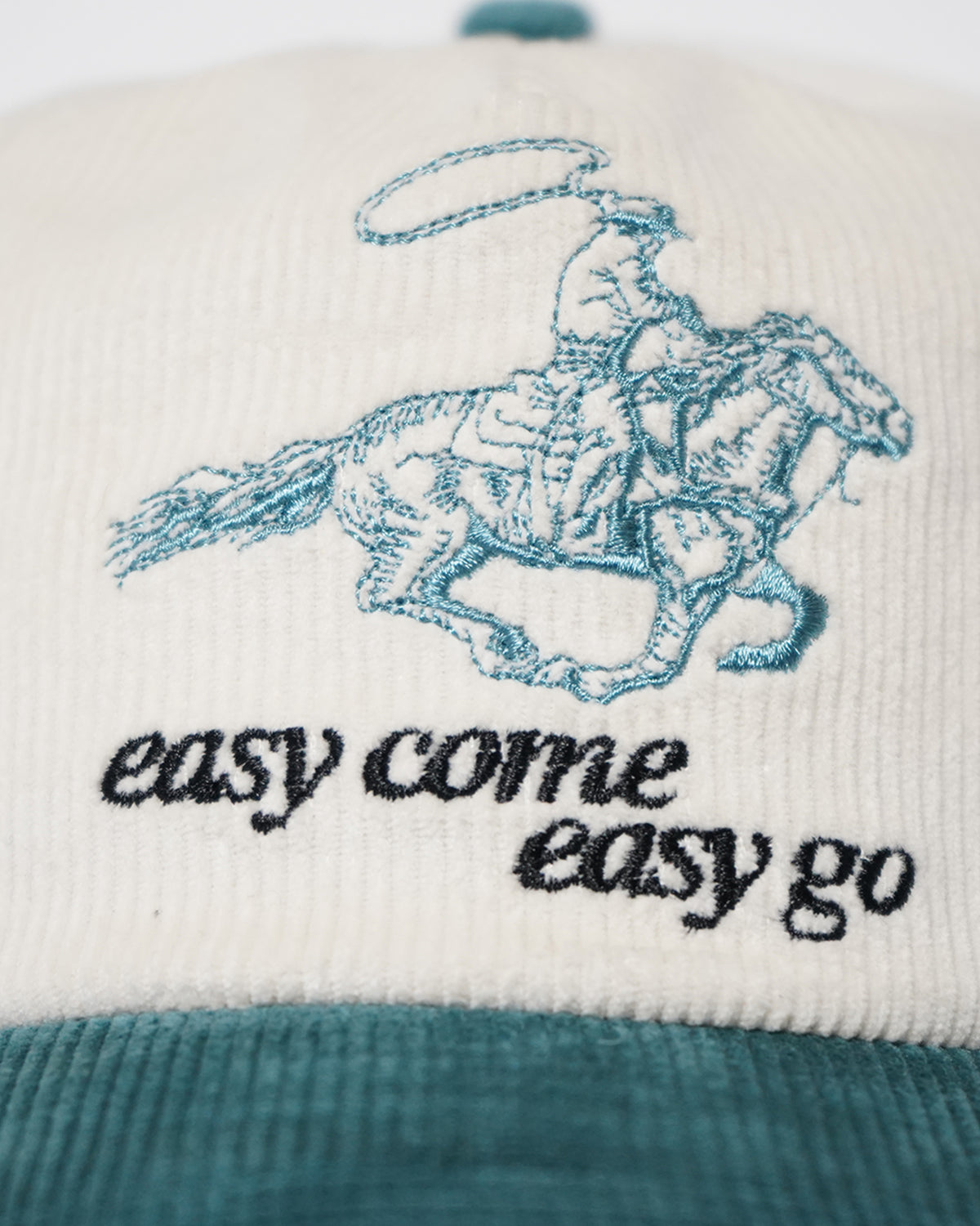 Easy Come Easy Go Hat in cream and tennis green corduroy with cowboy graphic, front view