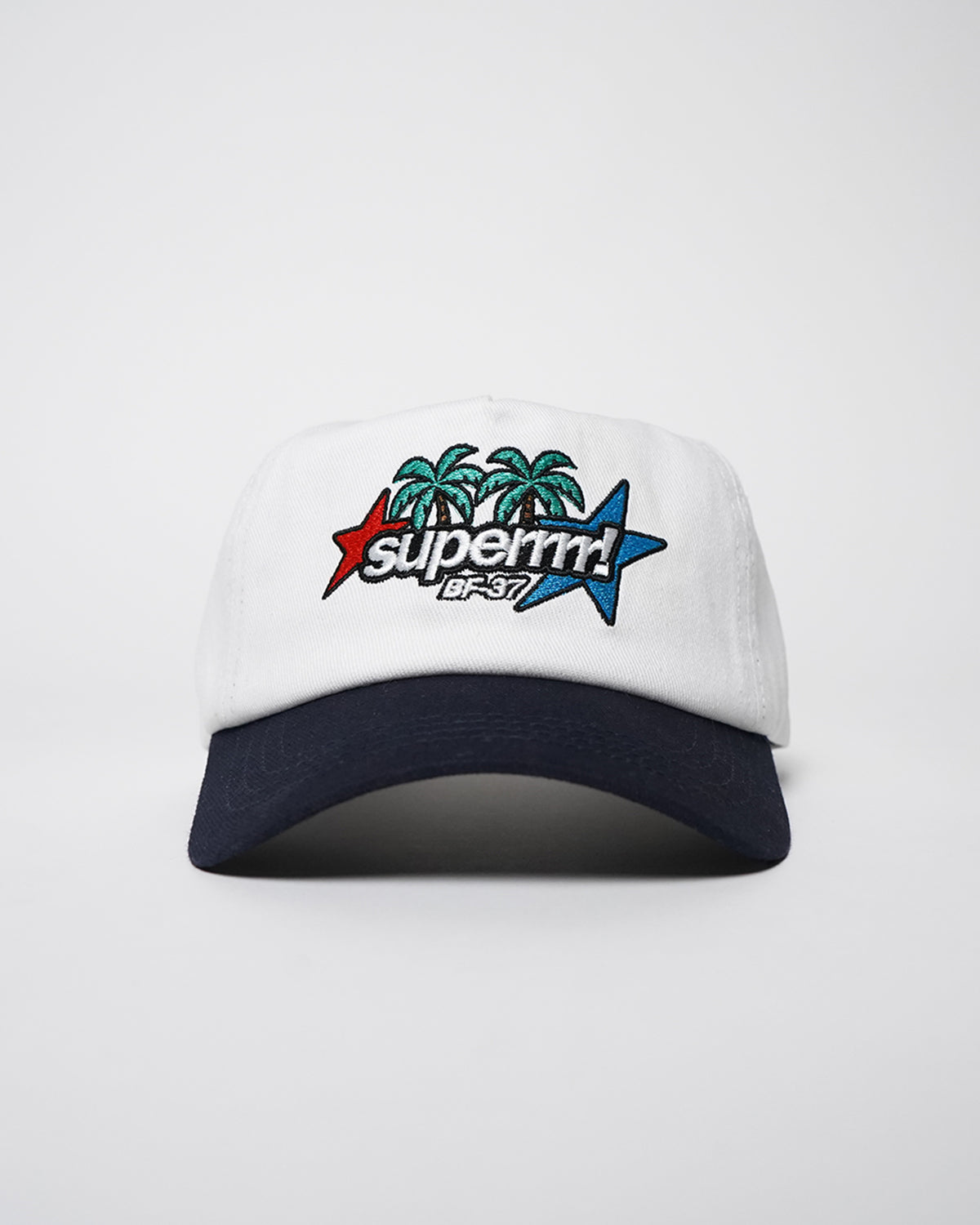 White Superrrr Hat with navy brim and embroidered palm trees, stars and superrrr! logo, front view