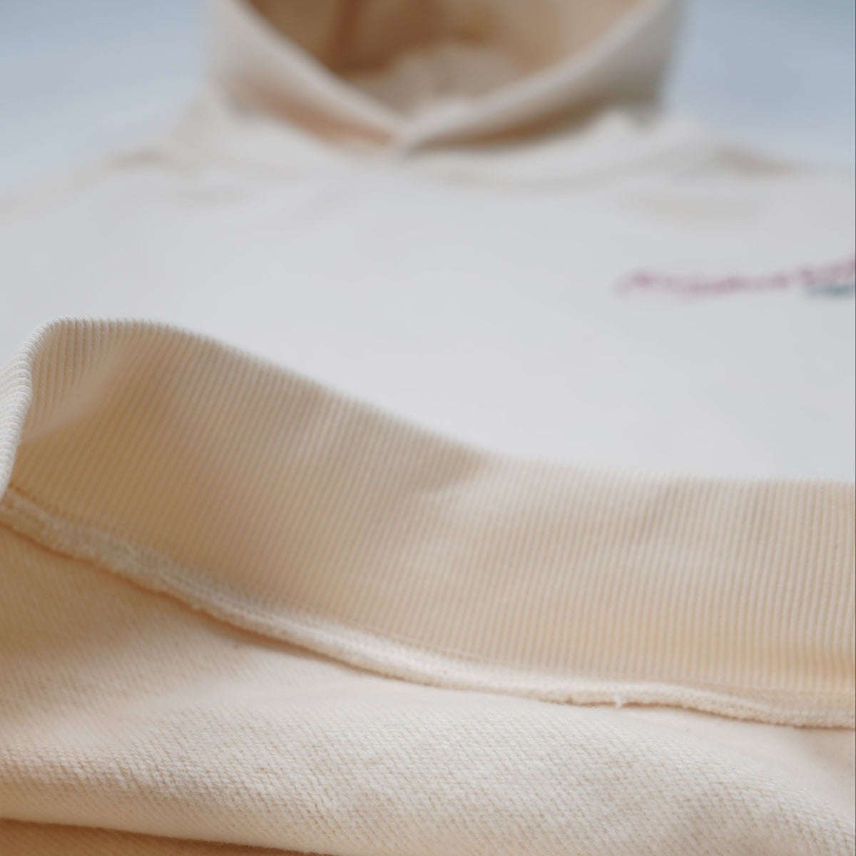 Close-up of beige fabric on a white background