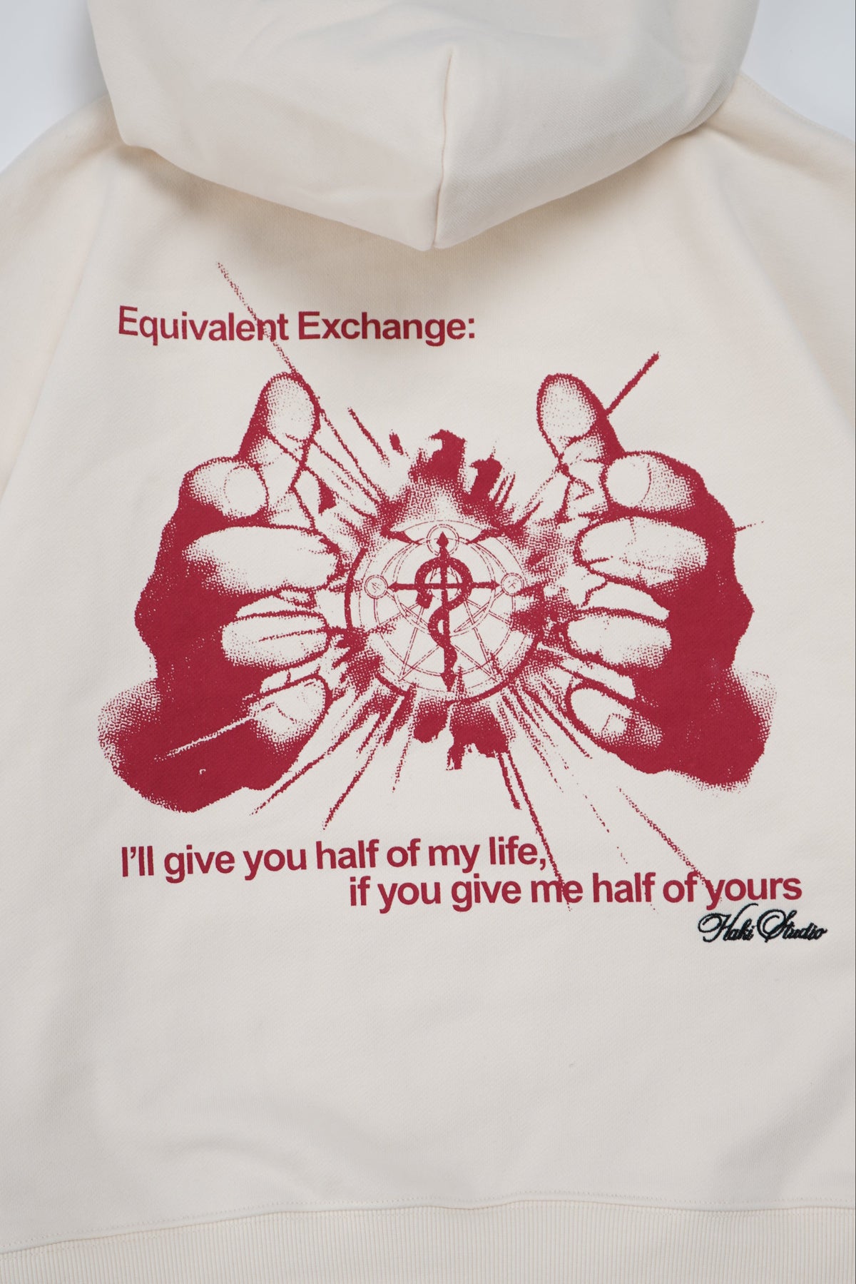 White hoodie with red graphic design and text on a white background