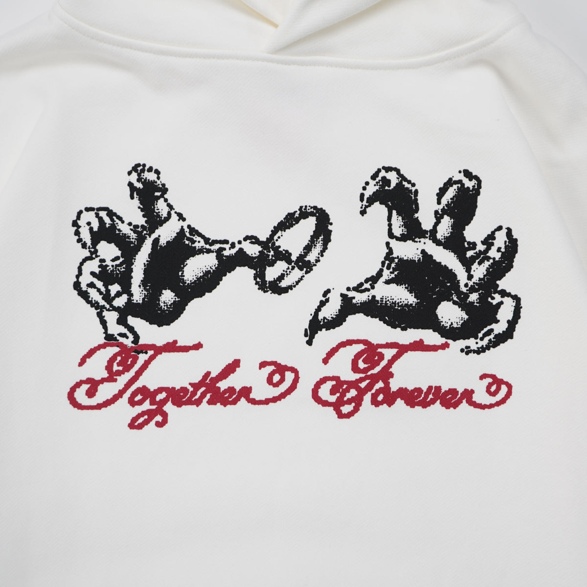 White hoodie with black paw prints and 'Together Forever' text on a white background