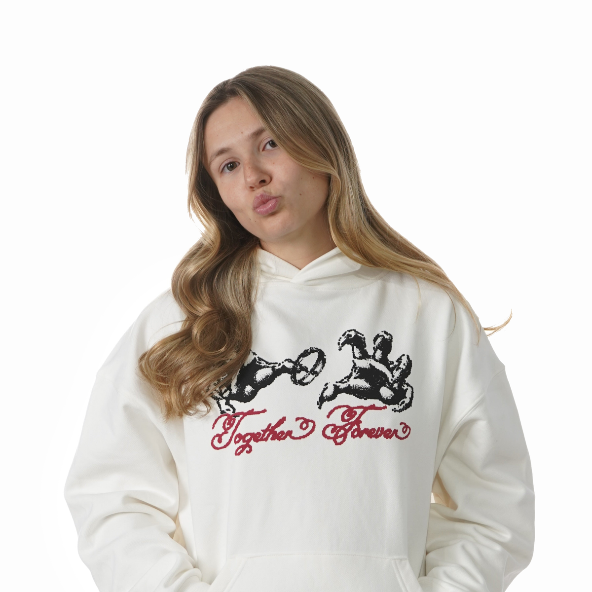 Person wearing a white hoodie with a graphic design and text on a white background