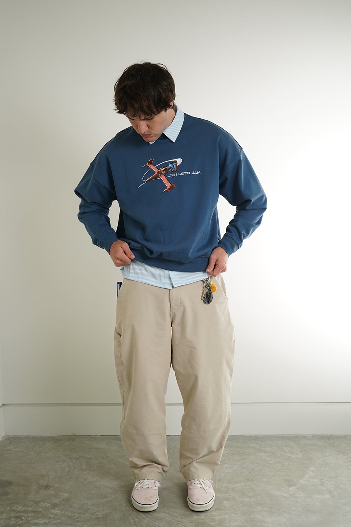 Blue Let's Jam Crewneck with embroidered spaceship and 321 LET'S JAM text, front view on model