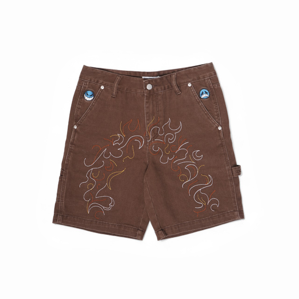 Brown shorts with embroidered design on a white background