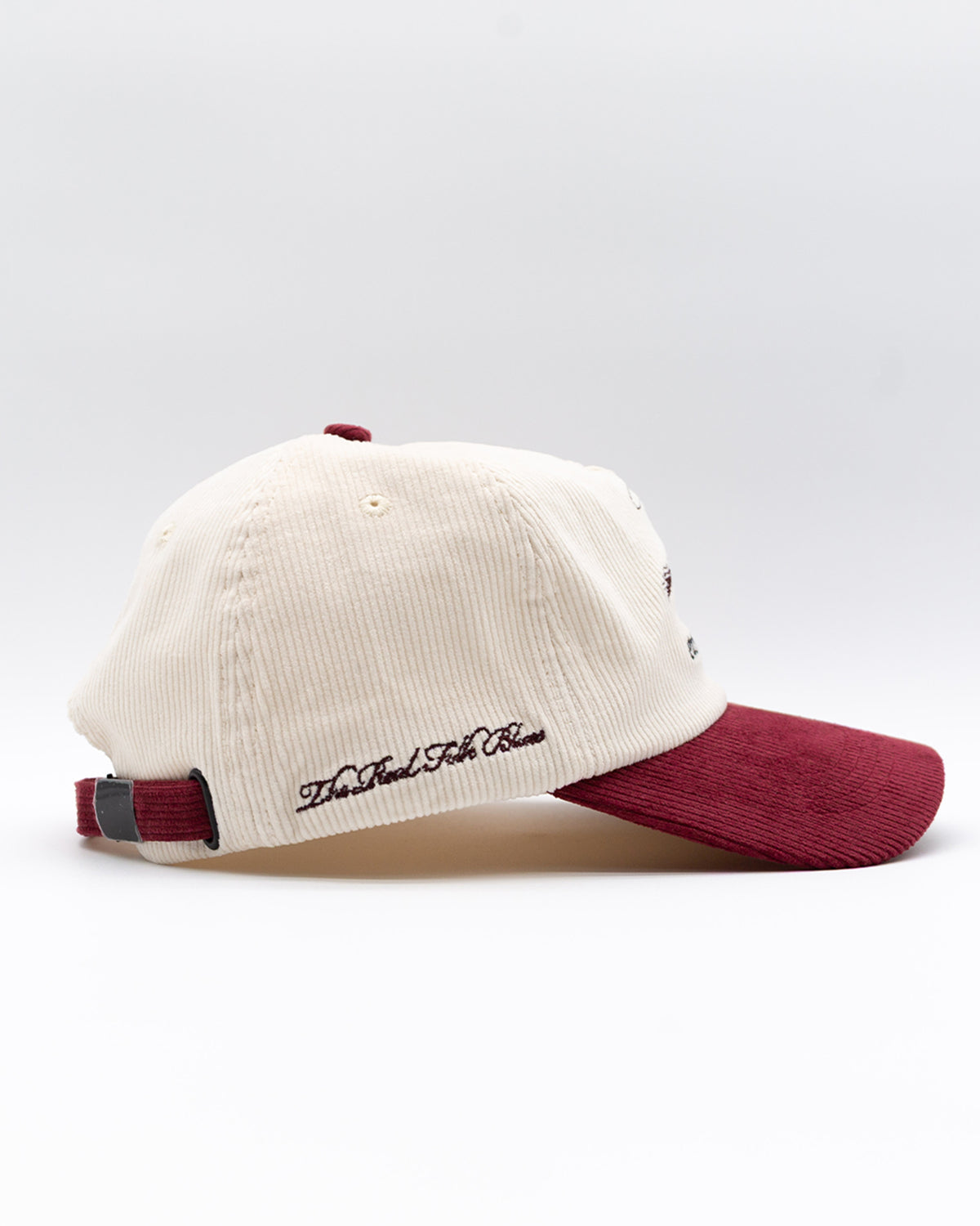 Easy Come Easy Go Hat in cream and burgundy colorblock with script embroidery, side view.